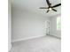Spacious bedroom with ceiling fan and large window at 242 Lakestone Estates, Pittsboro, NC 27312