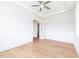 Bright and airy home office with hardwood floors and built-in shelving at 242 Lakestone Estates, Pittsboro, NC 27312