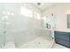 Large walk-in shower with marble tile at 242 Lakestone Estates, Pittsboro, NC 27312