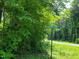 Lakeside Estates wooded lot with road access at 242 Lakestone Estates, Pittsboro, NC 27312