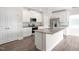 White kitchen cabinets, granite countertops and stainless steel appliances at 600 Rhino Bnd, Oxford, NC 27565