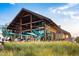 Community clubhouse with outdoor patio at 1713 Grassy Falls Ln, Wendell, NC 27591
