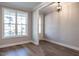 Dining area with hardwood floors and large window at 1713 Grassy Falls Ln, Wendell, NC 27591