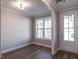 Bright foyer with hardwood floors and large window at 1713 Grassy Falls Ln, Wendell, NC 27591