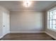 Spacious home office with hardwood floors and ample natural light at 1713 Grassy Falls Ln, Wendell, NC 27591