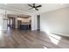 Open concept living room with view of kitchen and dining area at 1713 Grassy Falls Ln, Wendell, NC 27591