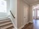 Stairway with hardwood treads and white risers at 1713 Grassy Falls Ln, Wendell, NC 27591