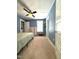 Spacious bedroom with a queen-size bed and ample closet space at 712 Groveview Wynd, Wendell, NC 27591