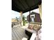 Relaxing backyard patio with covered seating area at 712 Groveview Wynd, Wendell, NC 27591