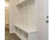 Functional mudroom with built-in bench and storage at 1719 Grassy Falls Ln, Wendell, NC 27591