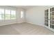 Spacious office with large windows and French doors at 1719 Grassy Falls Ln, Wendell, NC 27591