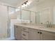 Elegant bathroom with double vanity and a large shower at 1719 Grassy Falls Ln, Wendell, NC 27591