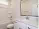 Clean bathroom with white vanity, quartz countertop and a shower/tub combo at 1719 Grassy Falls Ln, Wendell, NC 27591