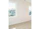 Spacious bedroom with neutral walls and large windows at 1719 Grassy Falls Ln, Wendell, NC 27591