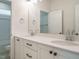 Modern bathroom with double vanity and white cabinets at 1719 Grassy Falls Ln, Wendell, NC 27591