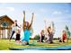 Yoga class taking place outdoors in a community setting at 1719 Grassy Falls Ln, Wendell, NC 27591