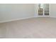 Bright office featuring French doors and neutral decor at 1719 Grassy Falls Ln, Wendell, NC 27591