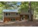 Ranch home with brick and siding exterior, nestled in woods at 2815 Fox Dr, Durham, NC 27712