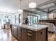 Large kitchen island with marble countertop and seating at 1113 Destination Dr, Apex, NC 27523