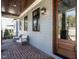Front porch with seating and brick flooring at 1113 Destination Dr, Apex, NC 27523