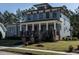 Two-story craftsman home with front porch at 1113 Destination Dr, Apex, NC 27523