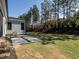 Large backyard with grassy area and trees at 1113 Destination Dr, Apex, NC 27523