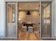 Home office with hardwood floors and built-ins at 1113 Destination Dr, Apex, NC 27523