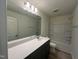 Bathroom with single vanity and a shower/tub combo at 260 Chestnut Oak Ln, Lillington, NC 27546