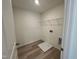 Laundry room with built in shelving at 260 Chestnut Oak Ln, Lillington, NC 27546