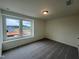 Bedroom with a large window offering a nice view at 260 Chestnut Oak Ln, Lillington, NC 27546