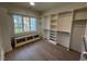 Spacious walk-in closet with built-in shelves and hanging rods at 4800 Latimer Rd, Raleigh, NC 27609