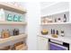 Well-organized pantry with ample shelving for storage at 40 Harvest View Way, Franklinton, NC 27525