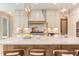 Modern kitchen featuring a large island and marble countertops at 40 Harvest View Way, Franklinton, NC 27525