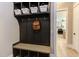 Functional mudroom with bench seating, cubbies, and hooks at 40 Harvest View Way, Franklinton, NC 27525