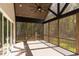 Spacious screened porch with wood ceiling and deck at 40 Harvest View Way, Franklinton, NC 27525