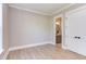 Bright bedroom with hardwood floors and access to a full bath at 40 Harvest View Way, Franklinton, NC 27525