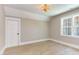 Spacious bedroom with large window and light hardwood floors at 40 Harvest View Way, Franklinton, NC 27525