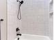 Clean, modern shower with subway tile and black accents at 40 Harvest View Way, Franklinton, NC 27525