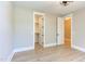 Bright bedroom with walk-in closet and light flooring at 40 Harvest View Way, Franklinton, NC 27525
