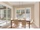 Bright dining room with a wood table and chandelier at 40 Harvest View Way, Franklinton, NC 27525