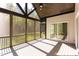 Large screened porch overlooking backyard and wooded area at 40 Harvest View Way, Franklinton, NC 27525