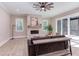 Spacious living room featuring a stone fireplace and hardwood floors at 40 Harvest View Way, Franklinton, NC 27525