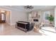 Living room with a stone fireplace and hardwood floors at 40 Harvest View Way, Franklinton, NC 27525