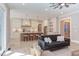 Modern kitchen with white cabinets and an island at 40 Harvest View Way, Franklinton, NC 27525