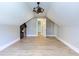 Spacious bedroom with sloped ceilings and chandelier at 40 Harvest View Way, Franklinton, NC 27525