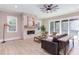 Spacious living room featuring a stone fireplace and hardwood floors at 40 Harvest View Way, Franklinton, NC 27525