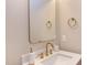 Vanity with gold faucet and modern mirror at 40 Harvest View Way, Franklinton, NC 27525