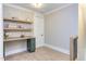 Home office with built-in desk and shelving at 40 Harvest View Way, Franklinton, NC 27525