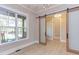Bright office with barn doors, hardwood floors and large window at 40 Harvest View Way, Franklinton, NC 27525