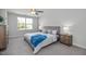 Spacious main bedroom with plush carpeting and ample natural light at 61 Fairwinds Dr, Lillington, NC 27546